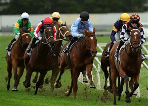 MELBOURNE, AUSTRALIA - JUNE 11: Mikaela Lawrence riding Bigolino around the home turn before winning Race 4, the Thoroughbred Club Handicap, during Melbourne Racing at Sandown Hillside on June 11, 2022 in Melbourne, Australia. (Photo by Vince Caligiuri/Getty Images)