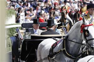 ASCOT, ENGLAND - JUNE 14: Prince Charles, Prince of Wales and Camilla, Duchess of Cornwall arrive in the parade ring during Royal Ascot 2022 at Ascot Racecourse on June 14, 2022 in Ascot, England. (Photo by John Phillips/Getty Images for Ascot Racecourse)