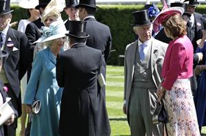 ASCOT, ENGLAND - JUNE 14: Camilla, Duchess of Cornwall and Prince Charles, Prince of Wales in the parade ring during Royal Ascot 2022 at Ascot Racecourse on June 14, 2022 in Ascot, England. (Photo by John Phillips/Getty Images for Ascot Racecourse)