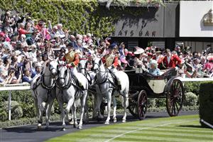 ASCOT, ENGLAND - JUNE 14: Prince Charles, Prince of Wales and Camilla, Duchess of Cornwall arrive in the parade ring during Royal Ascot 2022 at Ascot Racecourse on June 14, 2022 in Ascot, England. (Photo by John Phillips/Getty Images for Ascot Racecourse)