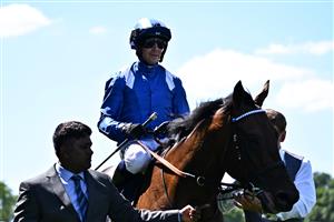 British jockey Jim Crowley riding Baaeed celebrates after winning the Queen Anne stakes on the first day of the Royal Ascot horse racing meet, in Ascot, west of London on June 14, 2022. (Photo by Ben Stansall / AFP) (Photo by BEN STANSALL/AFP via Getty Images)