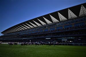 Jockeys and their horses compete in the Coventry Stakes race during the first day of the Royal Ascot horse racing meet, in Ascot, west of London on June 14, 2022. (Photo by Ben Stansall / AFP) (Photo by BEN STANSALL/AFP via Getty Images)