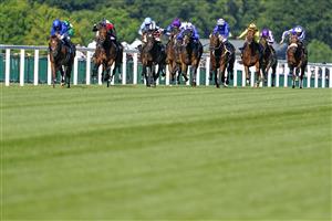 ASCOT, ENGLAND - JUNE 14: Daniel Tudhope riding Dubai Future (L, blue) win The Wolferton Stakes during Royal Ascot 2022 at Ascot Racecourse on June 14, 2022 in Ascot, England. (Photo by Alan Crowhurst/Getty Images)