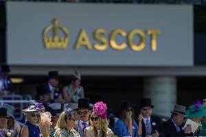 ASCOT, ENGLAND - JUNE 14: Racegoers wait for the royal procession during Royal Ascot 2022 at Ascot Racecourse on June 14, 2022 in Ascot, England. (Photo by Alan Crowhurst/Getty Images)