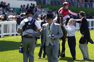 ASCOT, ENGLAND - JUNE 14: Hollie Doyle greets trainer Archie Watson after riding Bradsell to win The Coventry Stakes during Royal Ascot 2022 at Ascot Racecourse on June 14, 2022 in Ascot, England. (Photo by Alan Crowhurst/Getty Images)