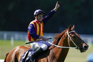 ASCOT, ENGLAND - JUNE 14: James McDonald celebrates after riding Nature Strip to win The King's Stand Stakes during Royal Ascot 2022 at Ascot Racecourse on June 14, 2022 in Ascot, England. (Getty)