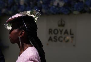 ASCOT, ENGLAND - JUNE 14: Racegoers arrive on during Day One of Royal Ascot 2022 at Ascot Racecourse on June 14, 2022 in Ascot, England. (Photo by Ryan Pierse/Getty Images)