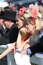 ASCOT, ENGLAND - JUNE 14: Racegoaers look on during Royal Ascot 2022 at Ascot Racecourse on June 14, 2022 in Ascot, England. (Photo by Eamonn M. McCormack/Getty Images for Ascot Racecourse)