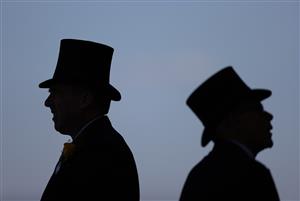 ASCOT, ENGLAND - JUNE 14: Racegoers look on during Day One of Royal Ascot 2022 at Ascot Racecourse on June 14, 2022 in Ascot, England. (Photo by Ryan Pierse/Getty Images)