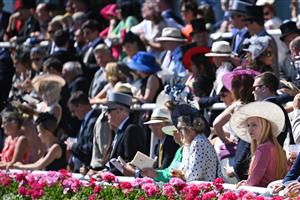 ASCOT, ENGLAND - JUNE 14: Racegoers look on during Royal Ascot 2022 at Ascot Racecourse on June 14, 2022 in Ascot, England. (Photo by Eamonn M. McCormack/Getty Images for Ascot Racecourse)