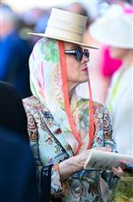 ASCOT, ENGLAND - JUNE 14: A racegoer attends Royal Ascot 2022 at Ascot Racecourse on June 18, 2022 in Ascot, England. (Photo by Eamonn M. McCormack/Getty Images for Ascot Racecourse)
