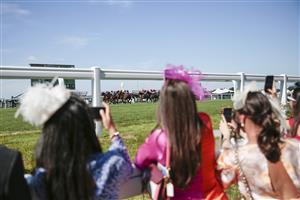 ASCOT, ENGLAND - JUNE 14: Guests watching the racing during Royal Ascot 2022 at Ascot Racecourse on June 14, 2022 in Ascot, England. (Photo by John Phillips/Getty Images for Ascot Racecourse)
