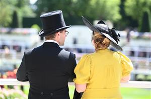 ASCOT, ENGLAND - JUNE 14: Racegoers attend Royal Ascot 2022 at Ascot Racecourse on June 14, 2022 in Ascot, England. (Photo by Eamonn M. McCormack/Getty Images for Ascot Racecourse)
