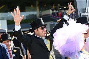 ASCOT, ENGLAND - JUNE 14: A racegoer attends Royal Ascot 2022 at Ascot Racecourse on June 18, 2022 in Ascot, England. (Photo by Eamonn M. McCormack/Getty Images for Ascot Racecourse)