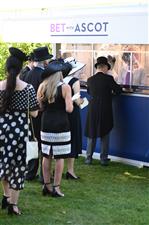 ASCOT, ENGLAND - JUNE 14: Guests placing bets during Royal Ascot 2022 at Ascot Racecourse on June 14, 2022 in Ascot, England. (Photo by Eamonn M. McCormack/Getty Images for Ascot Racecourse)