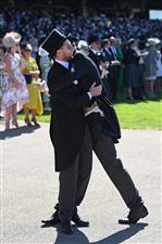 ASCOT, ENGLAND - JUNE 14: Racegoers share an embrace during Royal Ascot 2022 at Ascot Racecourse on June 14, 2022 in Ascot, England. (Photo by Eamonn M. McCormack/Getty Images for Ascot Racecourse)