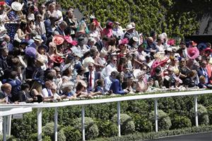 ASCOT, ENGLAND - JUNE 14: Racegoers looking on during Royal Ascot 2022 at Ascot Racecourse on June 14, 2022 in Ascot, England. (Photo by John Phillips/Getty Images for Ascot Racecourse)