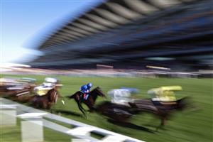 ASCOT, ENGLAND - JUNE 14: Horses pass the post during the Ascot Stakes during Royal Ascot 2022 at Ascot Racecourse on June 14, 2022 in Ascot, England. (Photo by Ryan Pierse/Getty Images)