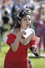 ASCOT, ENGLAND - JUNE 14: A racegoer attends Royal Ascot 2022 at Ascot Racecourse on June 18, 2022 in Ascot, England. (Photo by John Phillips/Getty Images for Ascot Racecourse)