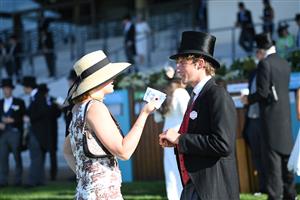 ASCOT, ENGLAND - JUNE 14: Racegoers during Royal Ascot 2022 at Ascot Racecourse on June 14, 2022 in Ascot, England. (Photo by Eamonn M. McCormack/Getty Images for Ascot Racecourse)