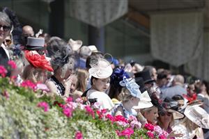 ASCOT, ENGLAND - JUNE 14: Racegoers lookin on during Royal Ascot 2022 at Ascot Racecourse on June 14, 2022 in Ascot, England. (Photo by John Phillips/Getty Images for Ascot Racecourse)