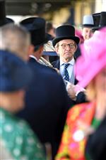 ASCOT, ENGLAND - JUNE 14: A racegoer attends Royal Ascot 2022 at Ascot Racecourse on June 14, 2022 in Ascot, England. (Photo by Eamonn M. McCormack/Getty Images for Ascot Racecourse)