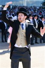 ASCOT, ENGLAND - JUNE 14: A racegoer celebrates a win during Royal Ascot 2022 at Ascot Racecourse on June 14, 2022 in Ascot, England. (Photo by Eamonn M. McCormack/Getty Images for Ascot Racecourse)