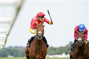 ASCOT, ENGLAND - JUNE 15: Shane Crosse celebrates as he rides State Of Rest to win The Prince Of Wales