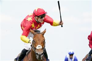ASCOT, ENGLAND - JUNE 15: Shane Crosse celebrates as he rides State Of Rest to win The Prince Of Wales