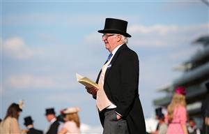 ASCOT, ENGLAND - JUNE 15: A spectator looks on during Day Two of Royal Ascot 2022 at Ascot Racecourse on June 15, 2022 in Ascot, England. (Photo by Alex Livesey/Getty Images)
