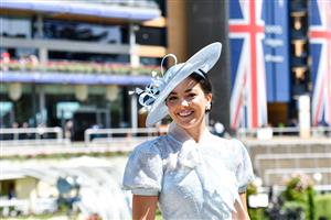 ASCOT, ENGLAND - JUNE 15: A racegoer attends Royal Ascot 2022 at Ascot Racecourse on June 15, 2022 in Ascot, England. (Photo by Kirstin Sinclair/Getty Images for Royal Ascot)