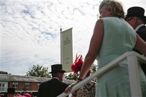ASCOT, ENGLAND - JUNE 15: Racegoers looking on during Royal Ascot 2022 at Ascot Racecourse on June 15, 2022 in Ascot, England. (Photo by John Phillips/Getty Images for Ascot Racecourse)