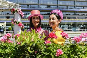 ASCOT, ENGLAND - JUNE 15: Lisa Tan wears Lisa Redman and Angela Menz attend Royal Ascot 2022 at Ascot Racecourse on June 15, 2022 in Ascot, England. (Photo by Kirstin Sinclair/Getty Images for Royal Ascot)