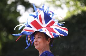 ASCOT, ENGLAND - JUNE 16: Racegoers arrive on Day Three during Royal Ascot 2022 at Ascot Racecourse on June 16, 2022 in Ascot, England. (Photo by Ryan Pierse/Getty Images)