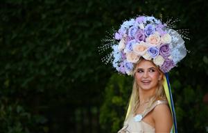 ASCOT, ENGLAND - JUNE 16: A racegoer arrives for day three of Royal Ascot 2022 at Ascot Racecourse on June 16, 2022 in Ascot, England. (Photo by Alex Livesey/Getty Images)