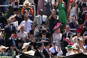 Race-goers take pictures of Britain