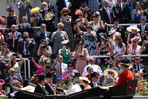 Race-goers take pictures of Britain