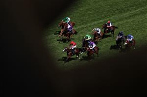 ASCOT, ENGLAND - JUNE 16: The Ridler (Red) ridden by Paul Hanagan wins the Norfolk Stakes during Day Three of Royal Ascot 2022 at Ascot Racecourse on June 16, 2022 in Ascot, England. (Photo by Ryan Pierse/Getty Images)
