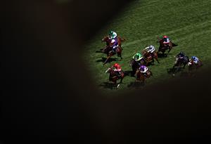 ASCOT, ENGLAND - JUNE 16: The Ridler (Red) ridden by Paul Hanagan wins the Norfolk Stakes during Day Three of Royal Ascot 2022 at Ascot Racecourse on June 16, 2022 in Ascot, England. (Photo by Ryan Pierse/Getty Images)