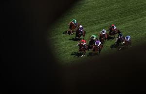 ASCOT, ENGLAND - JUNE 16: The Ridler (Red) ridden by Paul Hanagan wins the Norfolk Stakes during Day Three of Royal Ascot 2022 at Ascot Racecourse on June 16, 2022 in Ascot, England. (Photo by Ryan Pierse/Getty Images)