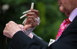 ASCOT, ENGLAND - JUNE 16: Racegoers get ready for day three of Royal Ascot 2022 at Ascot Racecourse on June 16, 2022 in Ascot, England. (Photo by Alex Livesey/Getty Images)
