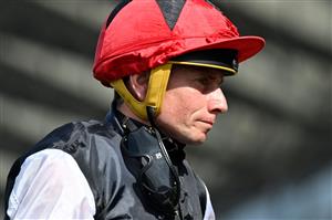 Jockey Ryan Moore returns to the winner