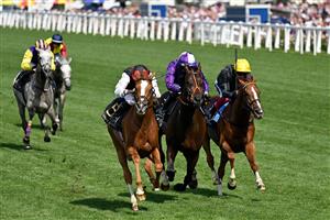 Jockey Ryan Moore rides Kyprios (C) to victory over Rossa Ryan on Mojo Star (2nd R) and Frankie Dettori on Stradivarius (R) in the Gold Cup on the third day, known as the Lady