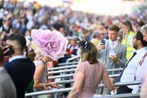 ASCOT, ENGLAND - JUNE 16: Racegoers during Royal Ascot 2022 at Ascot Racecourse on June 16, 2022 in Ascot, England. (Photo by Eamonn M. McCormack/Getty Images for Ascot Racecourse)