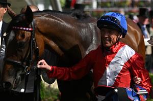 Frankie Dettori leads Inspiral after winning The Coronation Stakes on the fourth day of the Royal Ascot horse racing meeting in Ascot, west of London, on June 17, 2022. (Photo by JUSTIN TALLIS / AFP) (Photo by JUSTIN TALLIS/AFP via Getty Images)