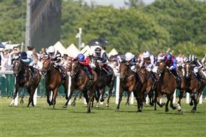 ASCOT, ENGLAND - JUNE 17: Frankie Dettori riding Inspiral (red) win The Coronation Stakes during Royal Ascot 2022 at Ascot Racecourse on June 17, 2022 in Ascot, England. (Photo by Alan Crowhurst/Getty Images)