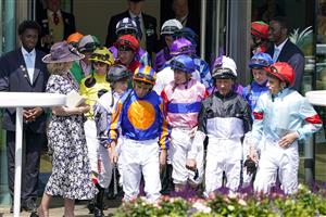 ASCOT, ENGLAND - JUNE 17: Jockeys leave the weighing room for the first race fo the day during Royal Ascot 2022 at Ascot Racecourse on June 17, 2022 in Ascot, England. (Photo by Alan Crowhurst/Getty Images)