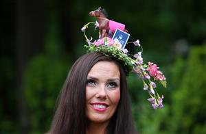 ASCOT, ENGLAND - JUNE 18: A racegoer with a horse hat arrives on day five of Royal Ascot 2022 at Ascot Racecourse on June 18, 2022 in Ascot, England. (Photo by Alex Livesey/Getty Images)