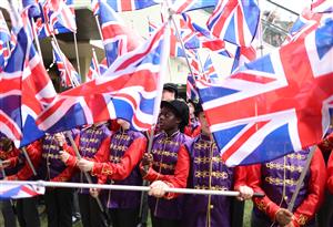 ASCOT, ENGLAND - JUNE 18: Union Jacks are waved during Royal Ascot 2022 at Ascot Racecourse on June 18, 2022 in Ascot, England. (Photo by Ryan Pierse/Getty Images)