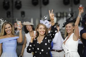 ASCOT, ENGLAND - JUNE 18: Racegoers enjoying refreshments in the Windsor Enclosure during Royal Ascot 2022 at Ascot Racecourse on June 18, 2022 in Ascot, England. (Photo by John Phillips/Getty Images for Ascot Racecourse)